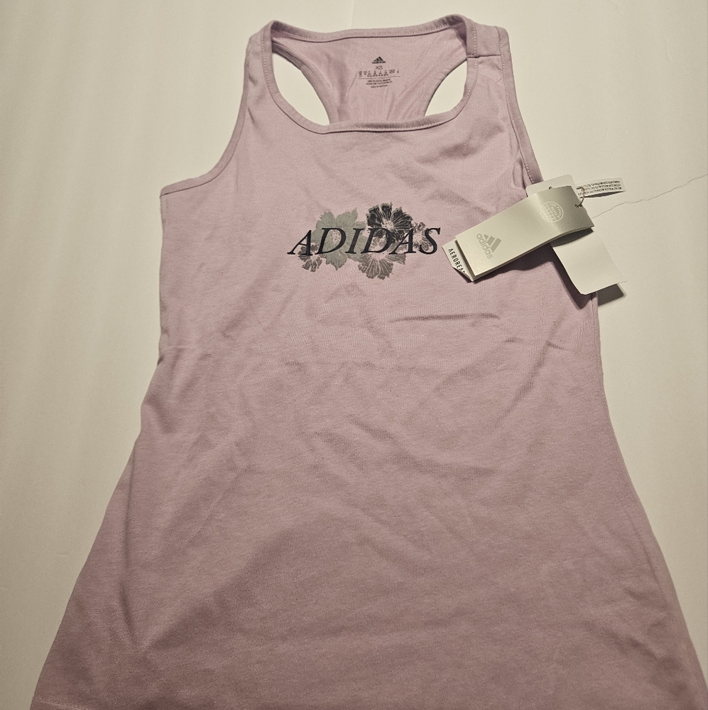 Women's • Running OWN THE RUN TANK TOP Extra Small